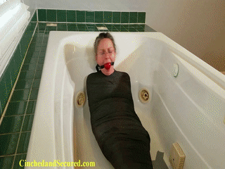 cinchedandsecured.com - 486 - Genevieve: Mummified In The Bath thumbnail