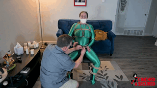 cinchedandsecured.com - 1480 - Minx Grrl - Super heroine tied, head fully taped and vibed! thumbnail